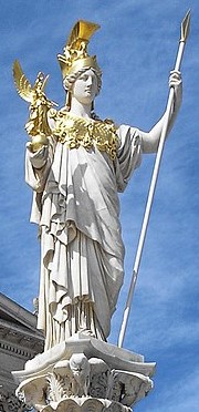 A sculpture of Athena in front of the Austrian Parliament Building in Vienna
